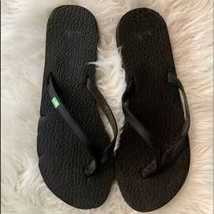 Black flip flops